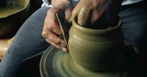 Potter Makes Clay Vase