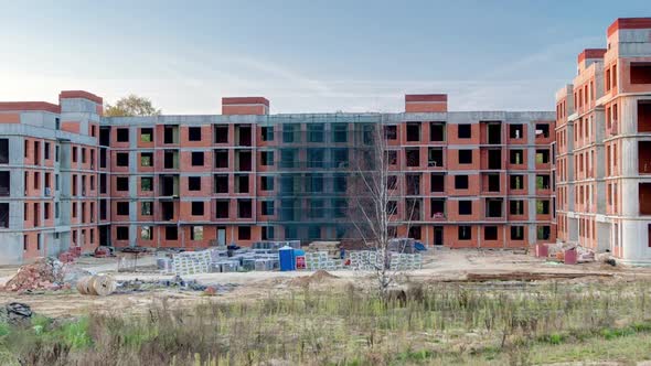 Construction Site with Buildings Under Construction and Multistorey Residential Homes Timelapse alt