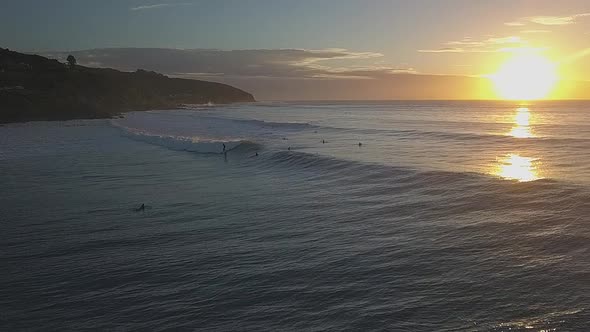 Surfing in sunset