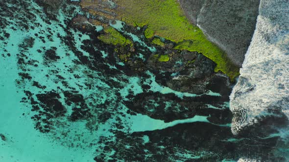 Aerial Drone Flight Over Reef Pattern Melasti Beach Bali Indonesia alt