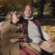 Caucasian senior couple sitting at the bench at park and embracing. Shot with RED helium camera in 4 - VideoHive Item for Sale