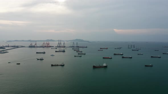 Drone flying with Refinery industry cargo ship. Fuel for transport.