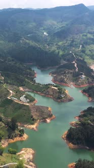 Aerial Vertica Panoramic View Landscape of the Lake of Guatape from Rock Piedra Del Penol, Colombia.