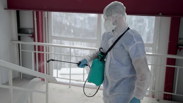 Disinfection of Premises During Coronavirus Pandemic Specialist in Protection Overall alt