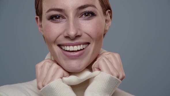 Smiling Model In Polo Neck alt