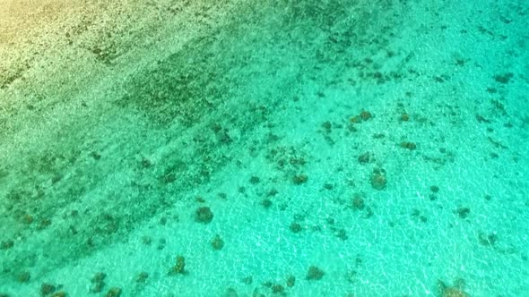 Aerial view of the lagoon of Moorea with the deep blue ocean in the background, Moorea, French Polyn alt