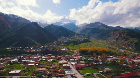 Beautiful Aerial View of Stepantsminda in the Caucasus Mountains Kazbegi Georgia alt