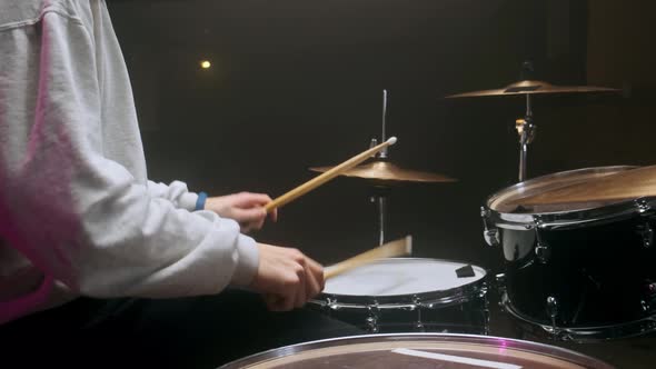 A Young Blogger Teaches the Game on the Drum Set alt