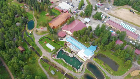 4K Drone Video of Convention Center at Chena Hot Springs Resort near Fairbanks, Alaska in Summer alt