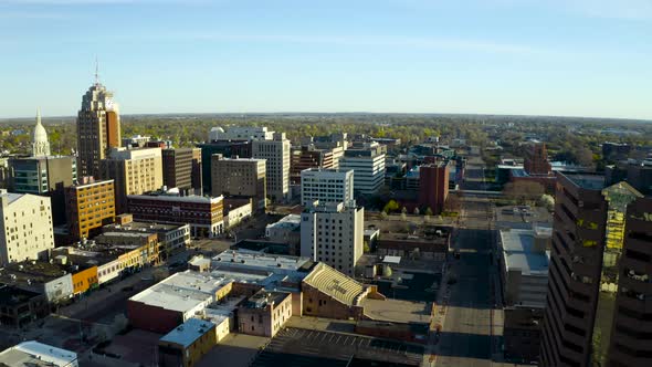4k drone video of the state capital in Lansing, Michigan as the sun rises alt