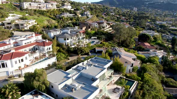 Aerial View of La Jolla Little Coastline City with Wealthy Villas and Swimming Pool  alt