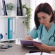 Woman Doctor in the Clinic - VideoHive Item for Sale