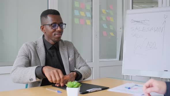 African Black Man Shake Hands with His Business Partner Caucasian Man