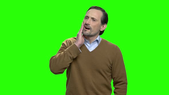 Middle Aged Man Suffering From Tooth Pain alt