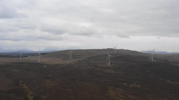 Wind farm in Scotland with turbines for electrical energy generation