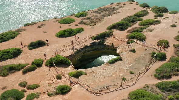 People Enjoying Unique Landscape at the Viewpoint alt