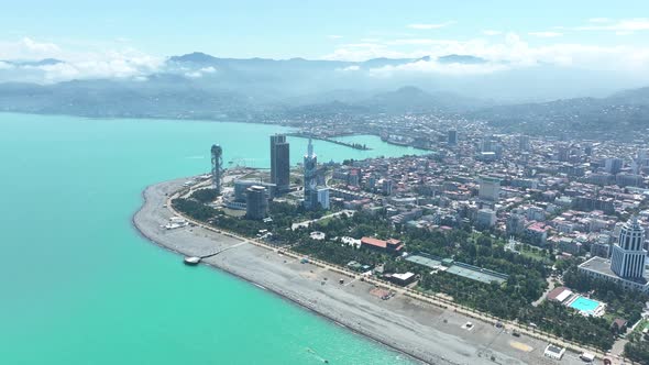 Aerial shot of modern buildings in downtown of Batumi. Cityscape of Batumi city, Georgia 2022 alt