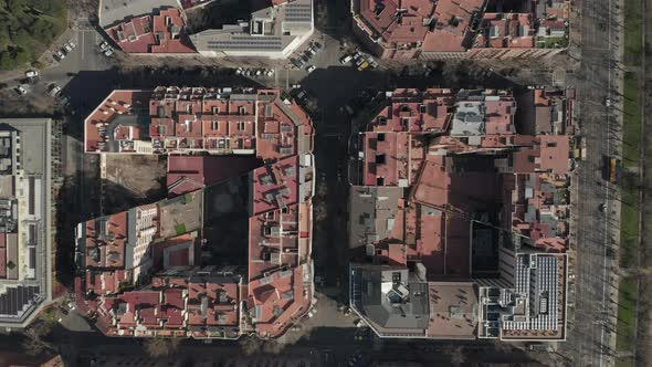 AERIAL: Barcelona Overhead Drone Shot of Typical City Blocks in Beautiful Sunlight with Urban alt