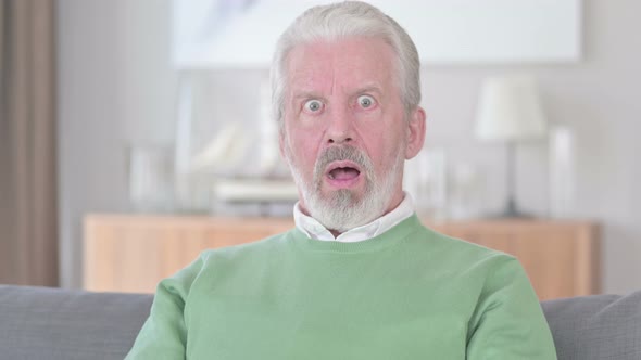 Upset Old Man Reacting To Failure alt