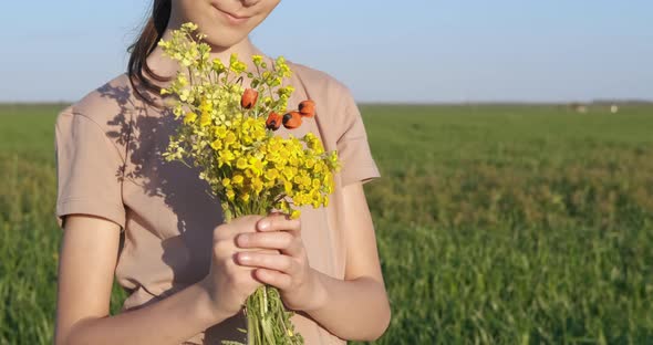 Colorful Wildflowers in Hands alt
