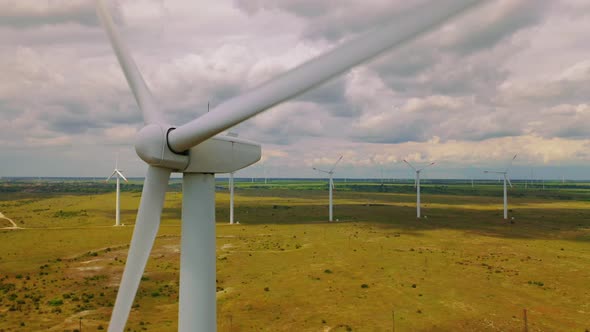 Aerial Drone Shot Windmills For Electric Power. Energy Production with clean and Renewable Energy