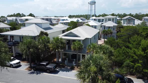 Mavic drone footage of house near a water tower alt