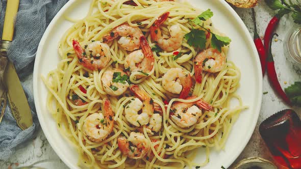 Seafood Concept. Pasta with Shrimps in a Plate, Close-up, Copy Space, Top View, Flat Lay alt