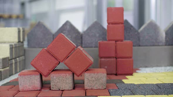 panorama of samples of finished paving stones in the exhibition hall alt