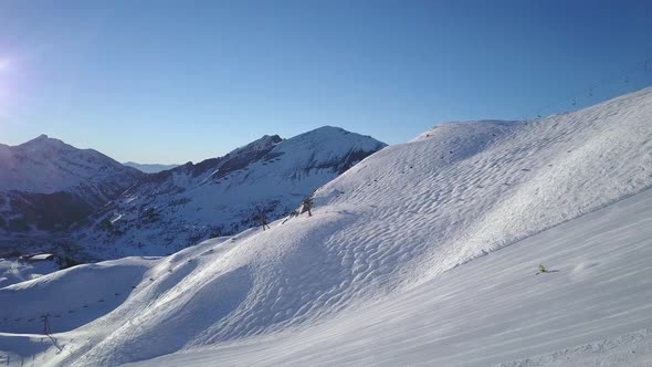 Wide Aerial View Winter Mountains With one Skier