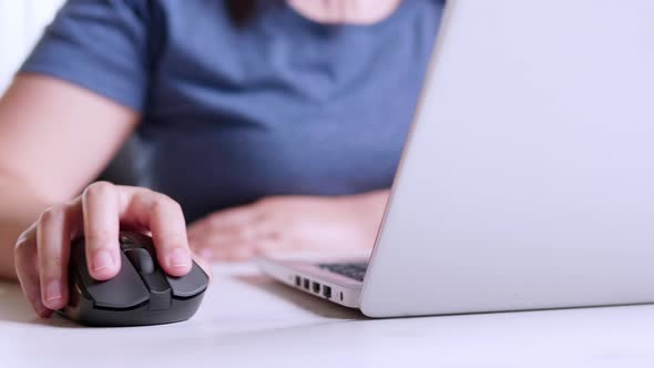 Businesswoman Hands typing on keyboard and clicking a computer mouse alt