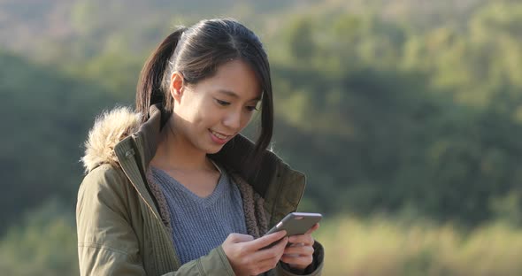 Woman use of smart phone alt