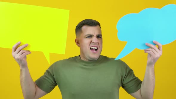 A Man Holds Two Backgrounds for the Insert Text and Shouts Loudly in the Frame alt