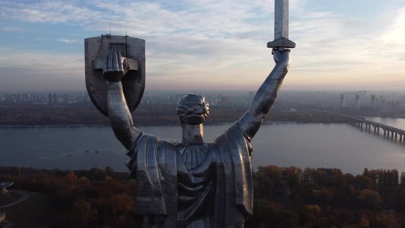 Statue of liberty over Kiev, Ukraine, rear view