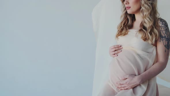 Closeup of Maternity Tummy or Potbelly alt