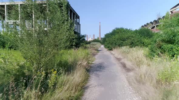 Walkpath In Abandoned Factory Complex Viskoza Loznica Serbia Low Drone Shot