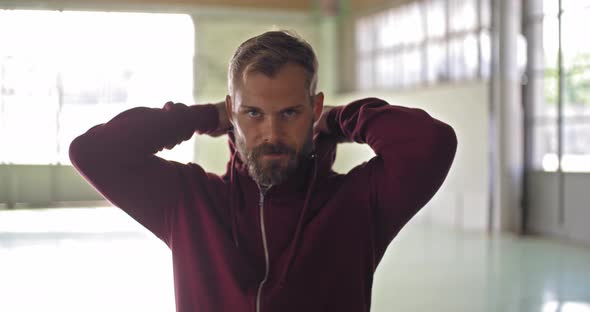 Young Adult Man with Hooded Sweatshirt Portrait After Fitness Sport Workout alt
