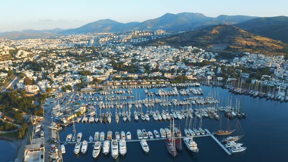 Aerial Footage of an Elite Yachts Moored in Port alt