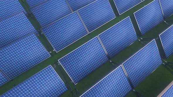 Solar panels or batteries on a green grass background alt