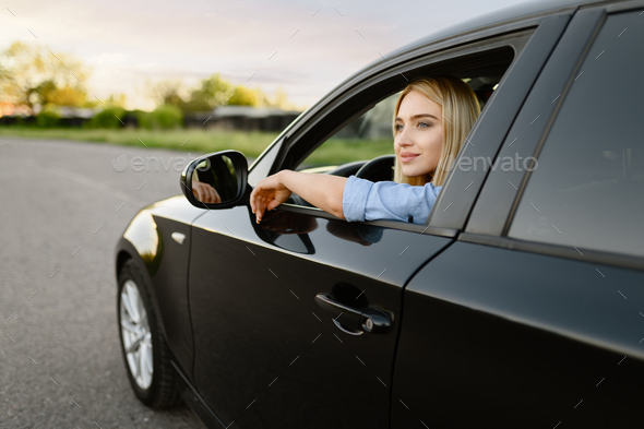 Woman Posing in Front of a Car · Free Stock Photo