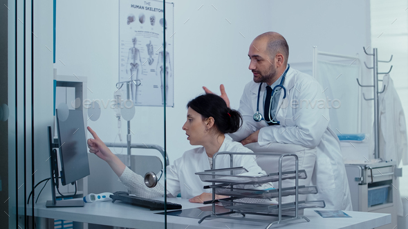 Consulting over a medical problem - Stock Photo - Images