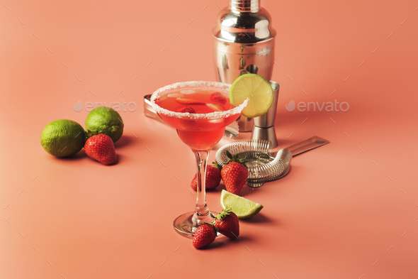 Strawberry red margarita alcoholic cocktail with tequila, liqueur, berries, lime juice - Stock Photo - Images