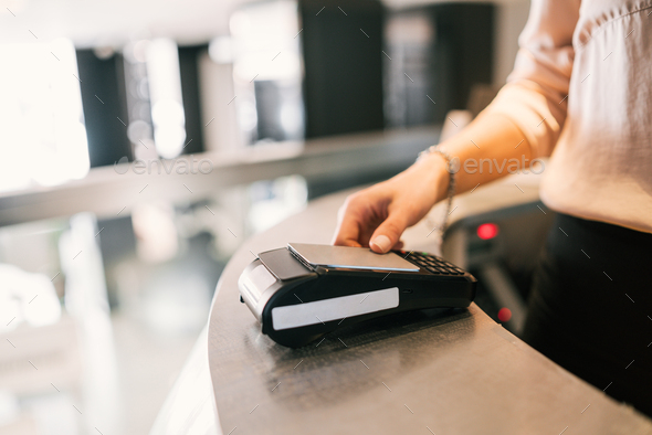 Guest makes card payment at check-in at reception.