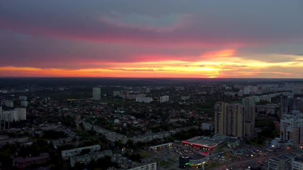 Epic aerial sunset in city residential district