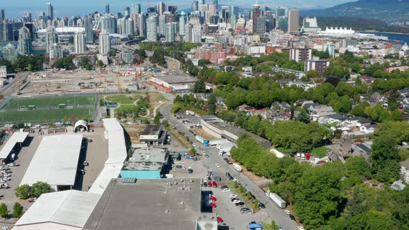 Downtown Vancouver With BC Place And Vancouver Lookout. View From Strathcona, East Vancouver, Canada alt