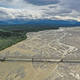 Aerial View over Big Delta River Junction and the Highway 2 Bridge Alaska - PhotoDune Item for Sale