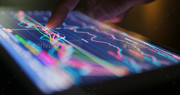 Stock market data on tablet - Stock Photo - Images