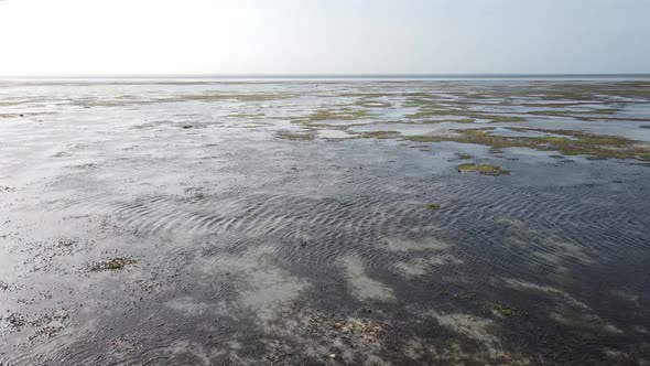 Aerial View of Low Tide in the Ocean Near the Coast of Zanzibar Tanzania alt