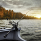 Fishing rod on the boat. Autumn season Stock Photo by voimages