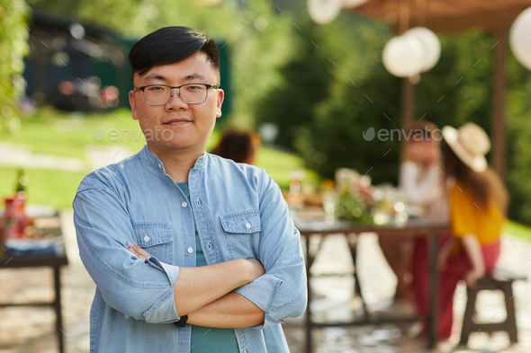 Young Asian Man Posing at Outdoor Summer Party