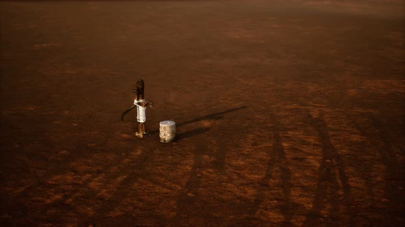 Old Rusted Metal Well in Desert alt